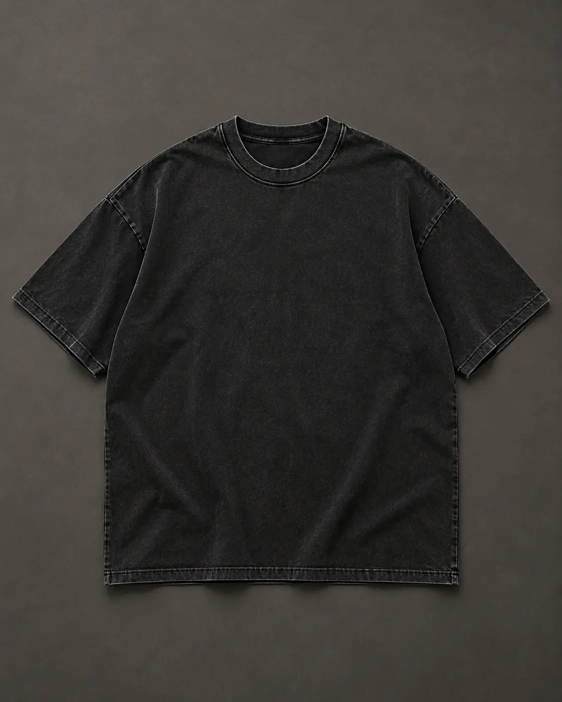 Washed-black oversized tee concept shown flat